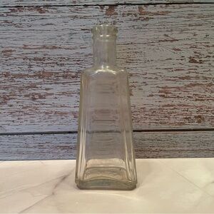 Vintage or antique bottle clear glass